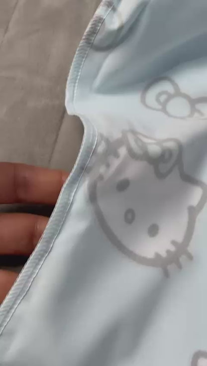 Hello Kitty celeste Top Clinico Mujer (abono 50%)